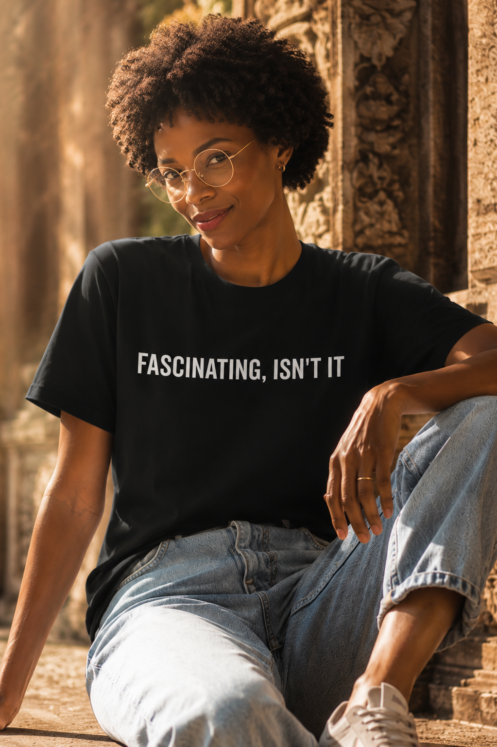 MANGCHO "Fascinating, Isn't It" T-shirt featuring a stylish design, worn by a model, showcasing casual streetwear fashion.